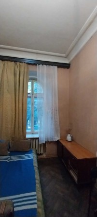 Комната в коммуне в центре. - фото 1