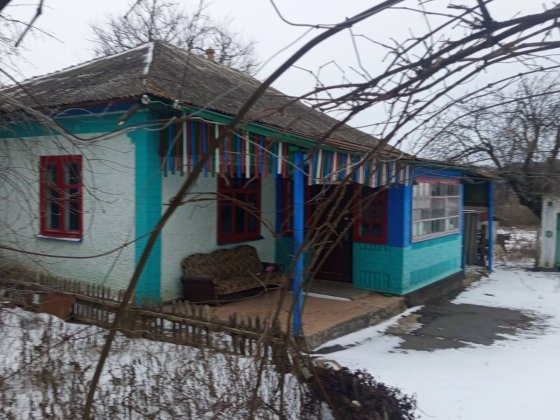 Дом с Червоне  Манжурія Гайворон