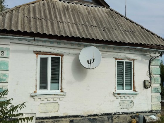 1/2(одна друга) частка садиби в селі Оситна з госп - побут будівлями