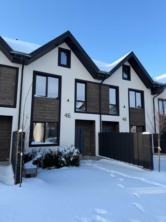 Продаж таунхауса біля парку в м. Буча з усіма комунікаціями - фото 1