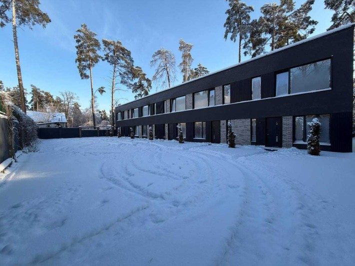 Сучасний таунхаус у затишній зеленій частині Бучі - фото 1