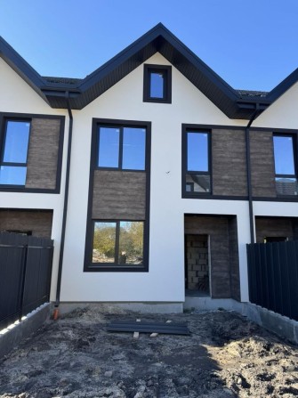 Продаж таунхаусів  м.Буча біля центрального парку. Топова локація! - фото 1