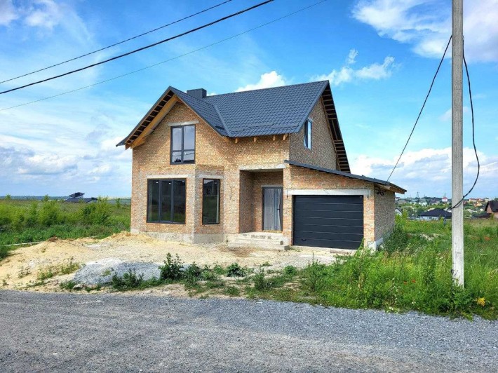 Двоповерховий будинок з гаражем - фото 1