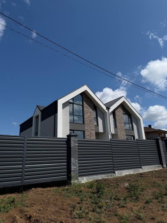 Поєднання переваг міського житла та приватного будинку - фото 1