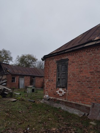 Продам перспективний будинок під ремонт у самому центрі Нова Водолага - фото 1