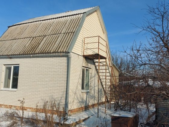 Дом п. Кринички. Тепличне