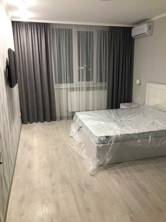 Здається в оренду сучасна 1-кім. квартира в новобудові по вул.Мікльоша - фото 1