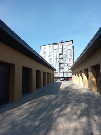 Оренда гаража ( для електромобіля) поряд Щасливе на Чорновола 94 - фото 1