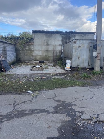 Продам место под строительство гаража - фото 1