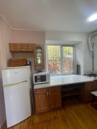 Центр частина будинку з місцем для авто - фото 1