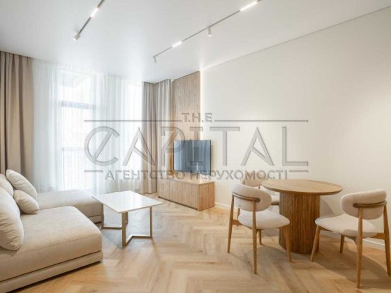 Нова дизайнеська квартира у ЖК "TRIIINITY",7–10 хв пішки до метро Киев