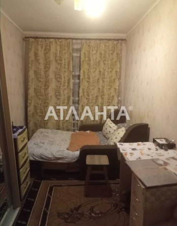 Кімната в комунальній квартирі на вул. Новаторів - фото 1