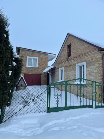 Частина будинку з житловою добудовою та гаражем - фото 1