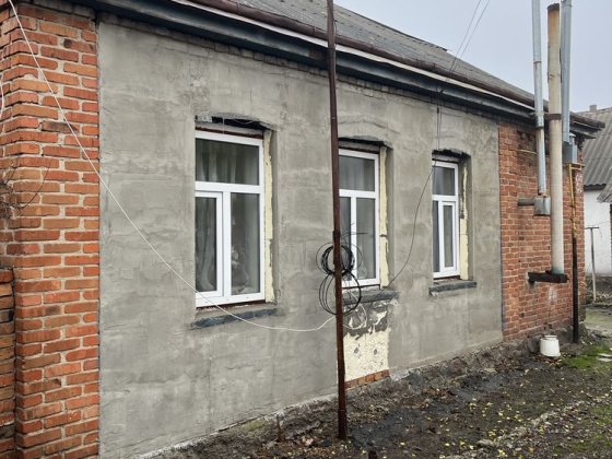 Півбудинку в гарному районі Лубни