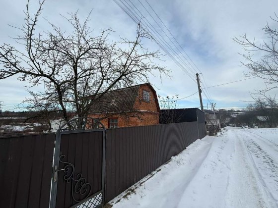 Затишний будинок, поруч зупинка, є погріб та гараж 42664 Хмельницький