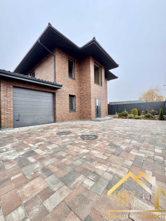 Продаж преміального двоповерхового будинку з гаражем у с. Гатне - фото 1