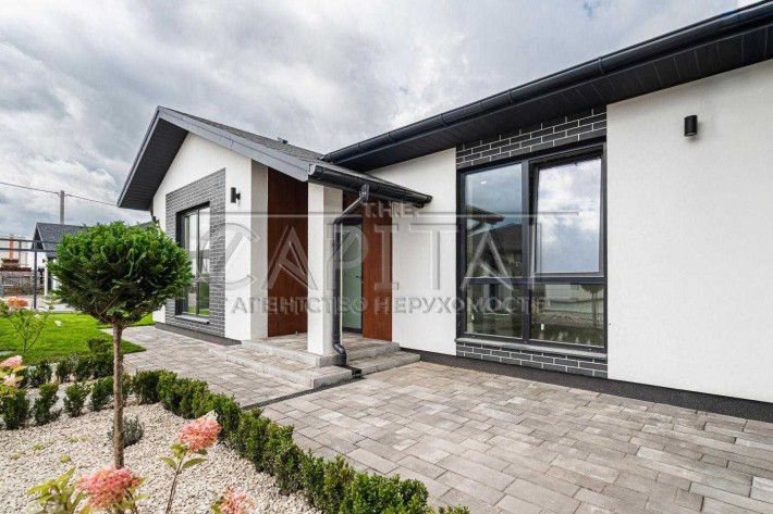 Продажа дома в новом коттеджном городке в с.Крюковщине Гатне - фото 1