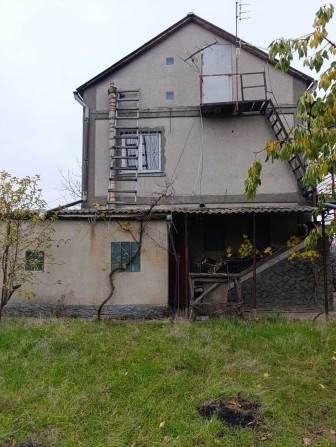 Капитальный дом в Светлом с подвалом и гаражом. Участок 6 соток. - фото 1