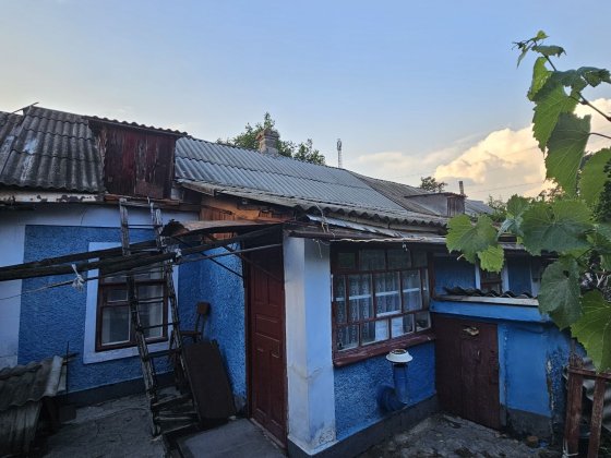 Часть дома в общем дворе