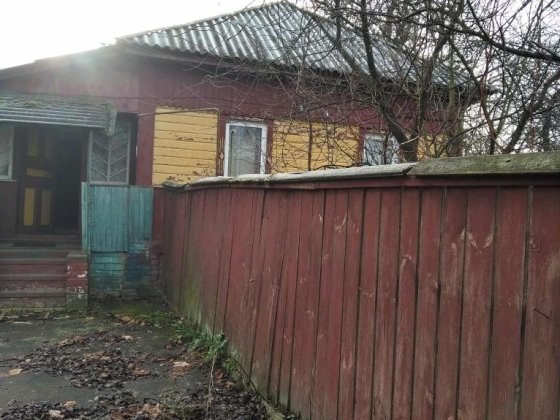 Дерев'яний будинок у м. Кролевець, район Подолово Кролевец