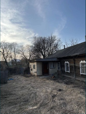 Будинок смт.Ріпки на березі річки - фото 1