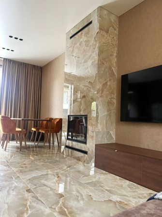 Продаж ШИКАРНОГО дуплексу з РЕМОНТОМ в центрі Бучі - фото 1