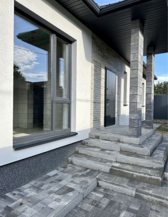 Сучасний одноповерховий будинок у Лісовій Бучі - фото 1