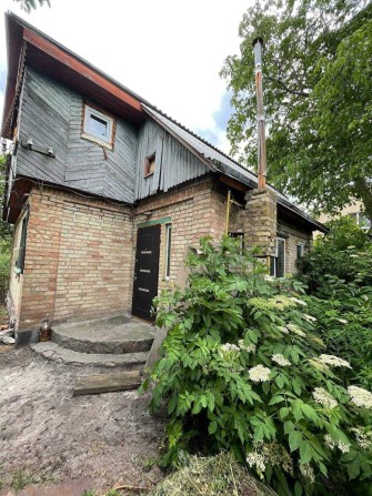 Продам будинок з ділянкою 8 соток в місті Буча біля озера - фото 1