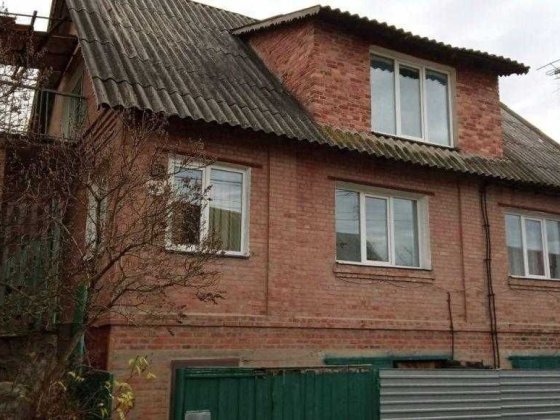 У продажу цегляний двоповерховий будинок Полтава