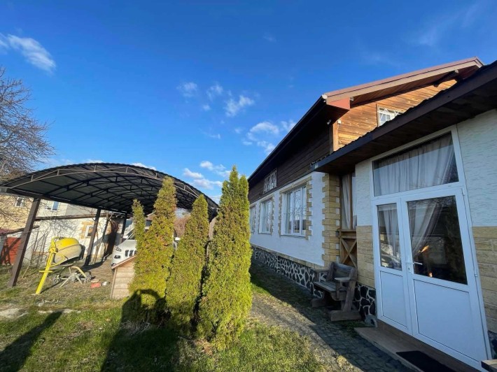 Буча продаж двоповерхового будинку з гостьовим - фото 1