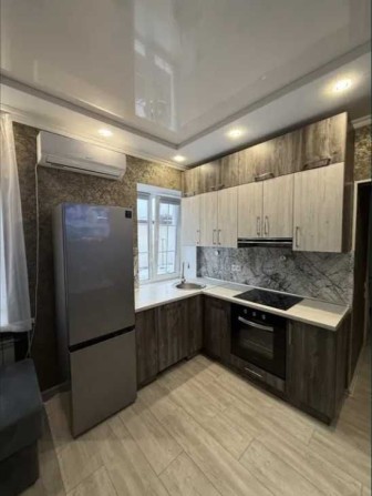 Квартира на землі з власним подвір'ям. Центр міста - фото 1