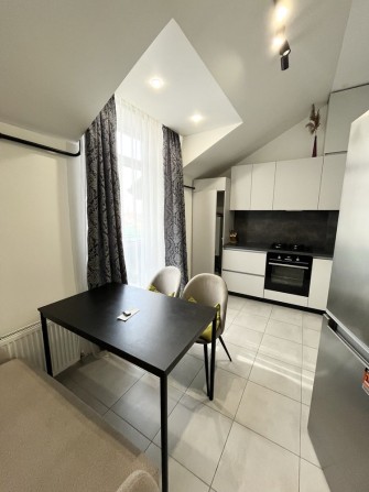 Парковка!Газ!Сдам на долгосрочно  1 к. в клубном доме!Кухня-студия - фото 1