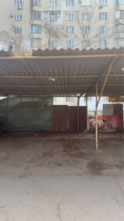 Продам/сдам место на крытой стоянке (Жулио Кюри) - фото 1