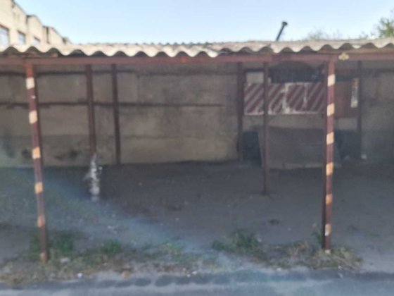 Сдам крытое паркоместо на стоянке по улице Ньютона новые Дома