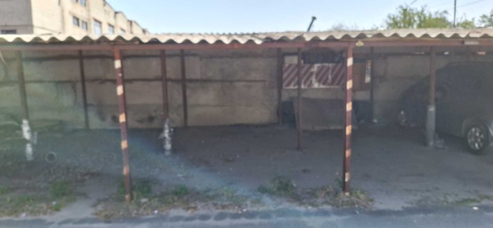 Сдам крытое паркоместо на стоянке по улице Ньютона новые Дома - фото 1