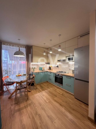 Продаж 2к квартири з двориком, вул.Промислова 1Л , ЖК Емоція, Хотів - фото 1