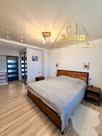 Простора 2 кімнатна з сучасним ремонтом - фото 1