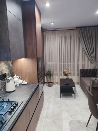 Продам простору 1к квартиру з гарним ремонтом в сучасному ЖК - фото 1