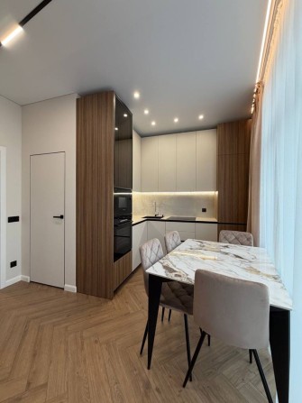 Прожаж дизайнерської квартири - фото 1