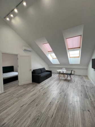 Оренда мансардної 1-кім квартири з терасою 54 м2 в ЖК Комфорт Таун - фото 1