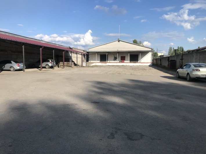 Продам капитальный склад с рампой м офисным помещением. - фото 1
