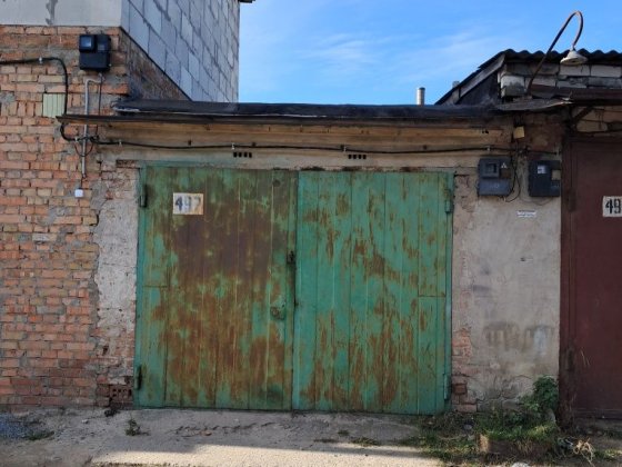 Гараж двоповерховий в яму.