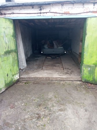 Гараж за бурсой с документамі - фото 1