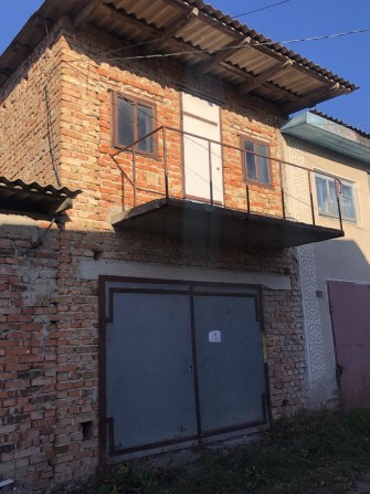 Гараж цегляний двоповерховий з підвалом - фото 1