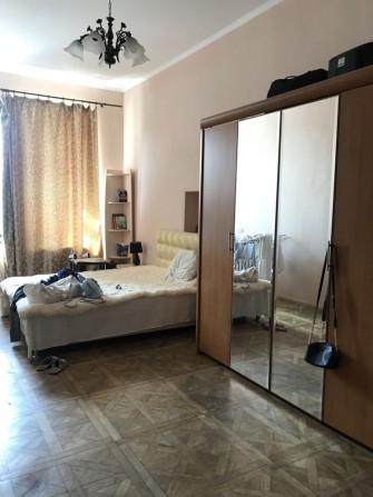 Кімната в комуне цент міста, вул. Новосельского - фото 1