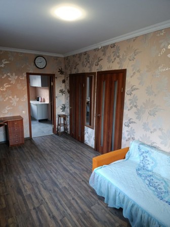 Половина будинку з окремим входом і парковочним  місцем в Жулянах - фото 1