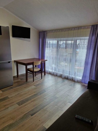 Зручна студія в автономному будинку - фото 1