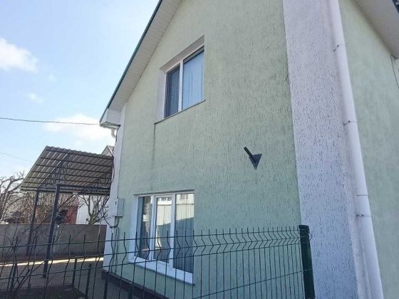 Будинок з якісним ремонтом, земельною ділянкою та сонячними панелями Хмельницький