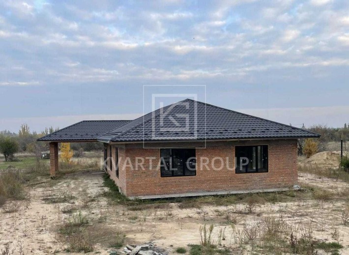 Одноповерховий цегляний будинок. Білогородка - фото 1