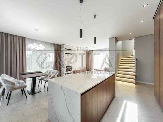 Продається просторий будинок 195 м² із ремонтом каміном та водяним опаленням розташований у котеджно Ходосівка